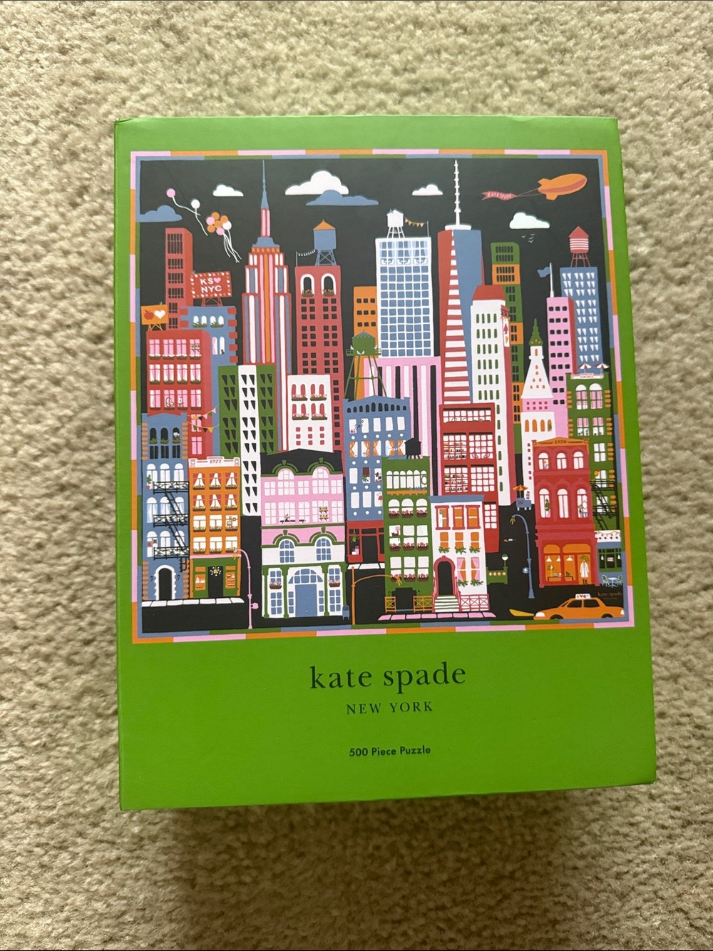 kate spade Green Cityscape 500-Piece Puzzle with Multicolored Buildings